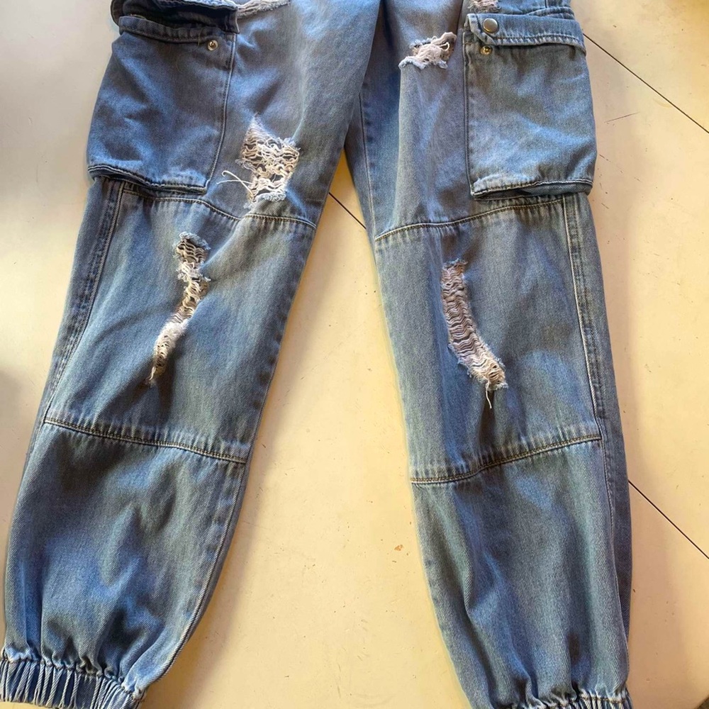 High-Waisted Ripped Jeans with Cinched ankles